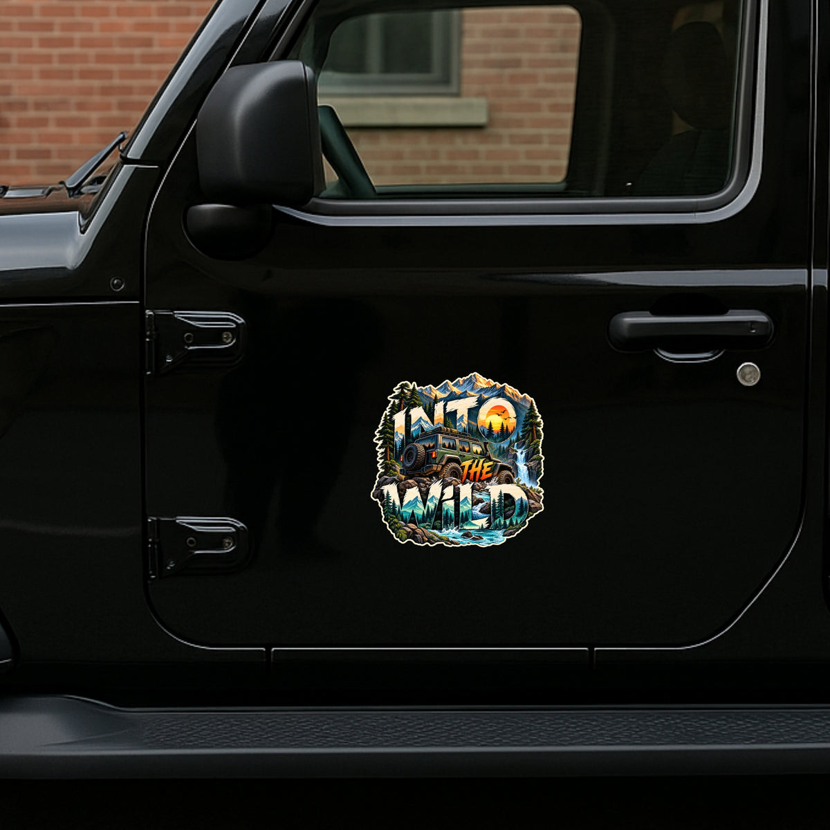 Into The Wild Mountain Off Road Adventure Sticker Displayed on Black SUV Side Door by STIXY