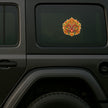 Kirtimukha Protective Guardian Face Sticker Displayed on Black SUV Rear Side Window by STIXY
