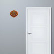 Kirtimukha Fierce Guardian Face Sticker Displayed on Interior Wall Beside Door for Traditional Home Decor by STIXY