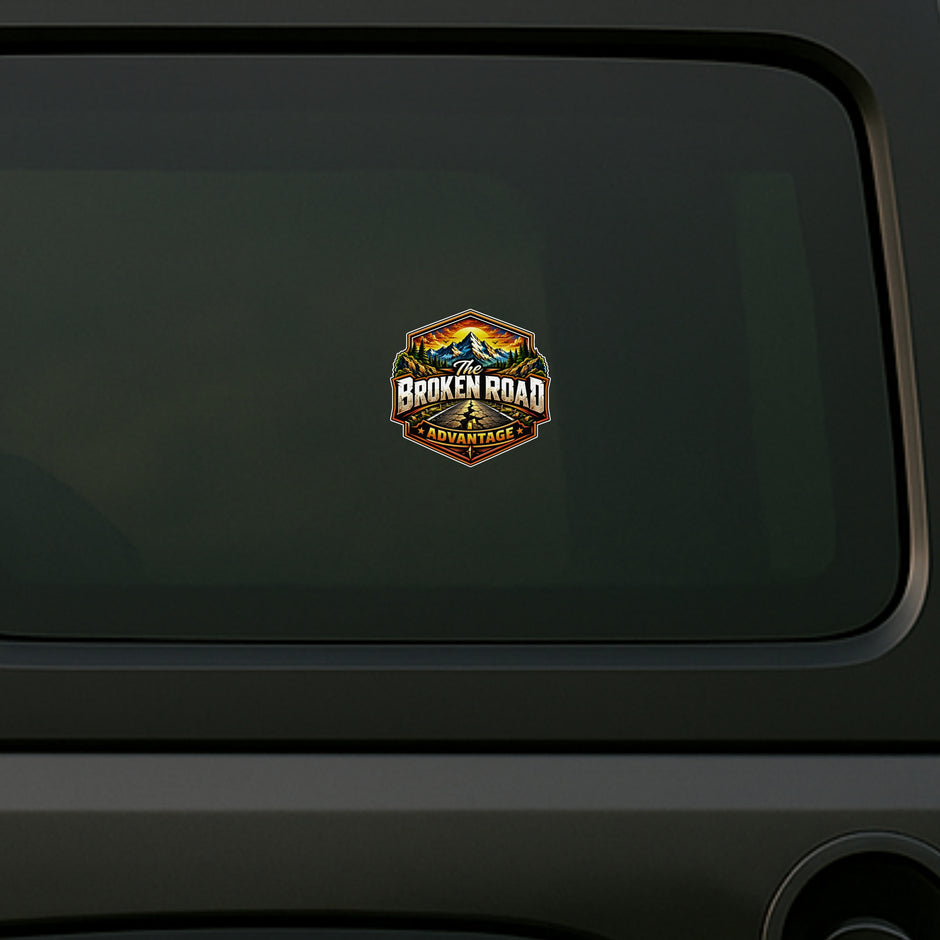 The Broken Road Adventure Sticker Displayed on Dark SUV Side Window by STIXY