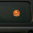 Jai Shri Ram Hanuman Gada Sticker Applied on Dark Vehicle Window Featuring Orange Devotional Hanuman Mace Emblem and Jai Shri Ram Text by STIXY