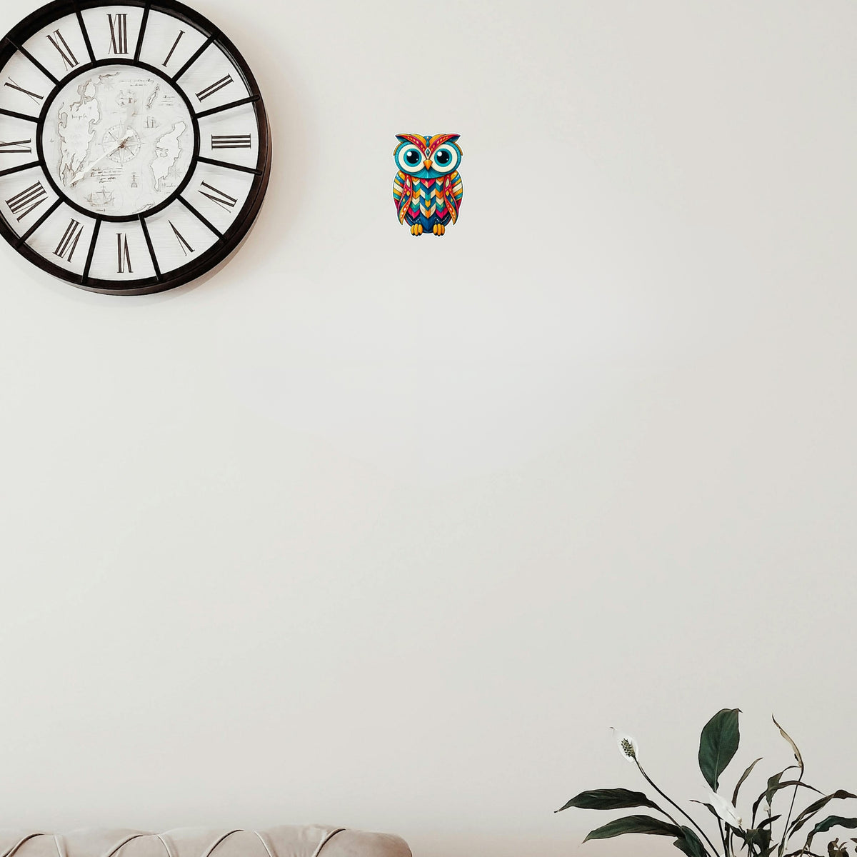 Colorful Geometric Owl Sticker Displayed on Wall by STIXY