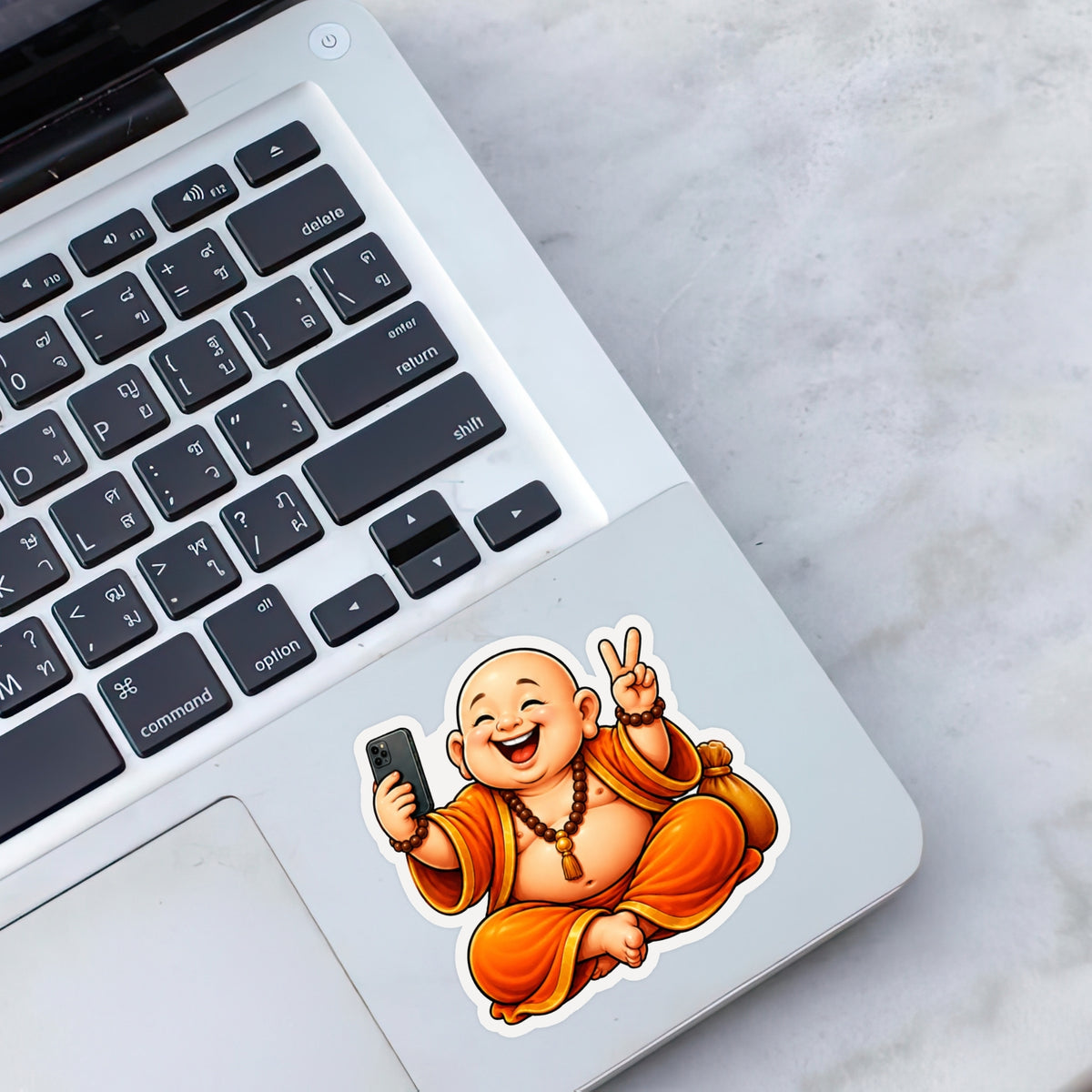 Modern Laughing Buddha Waterproof Sticker Applied on Laptop by STIXY